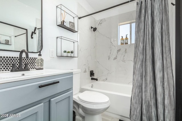 full bathroom featuring vanity, toilet, and shower / tub combo with curtain