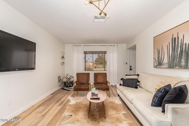 living room with hardwood / wood-style flooring