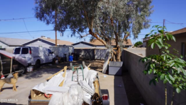 exterior space with a fenced backyard