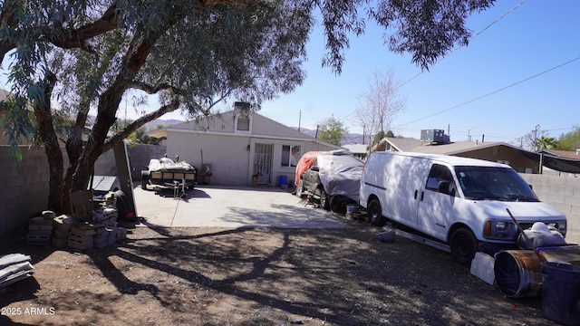 exterior space featuring a patio and fence