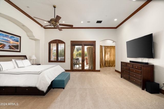 carpeted bedroom featuring ceiling fan, access to exterior, french doors, and ornamental molding