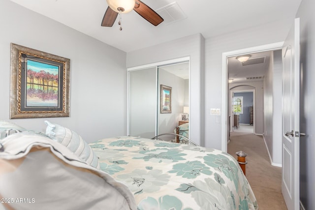 905 S Osborn Ln, Gilbert, AZ 85296 - carpeted bedroom featuring a closet and a ceiling fan
