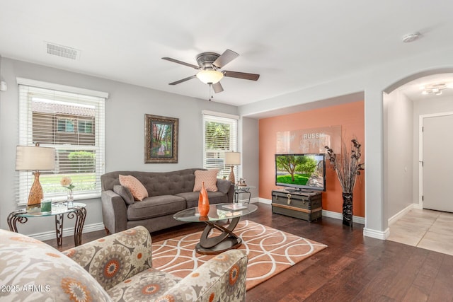 905 S Osborn Ln, Gilbert, AZ 85296 - living room featuring arched walkways, ceiling fan, and wood finished floors