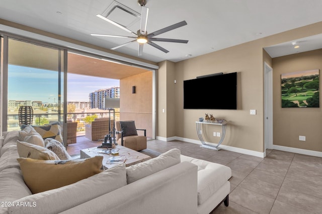 tiled living room featuring ceiling fan