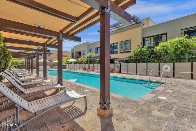 view of pool featuring a patio