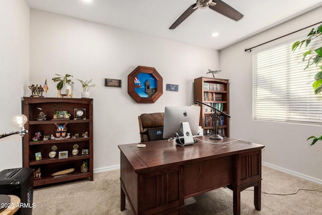 office area featuring a ceiling fan, recessed lighting, light carpet, and baseboards