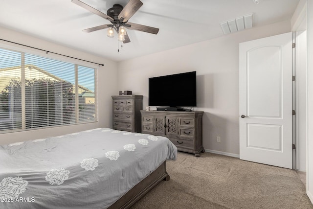 bedroom featuring carpet floors, visible vents, ceiling fan, and baseboards