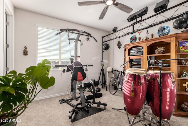 workout area with carpet floors and ceiling fan