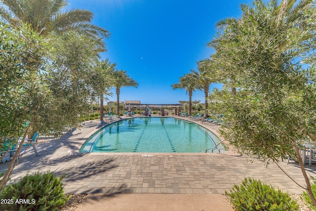 pool with a patio area