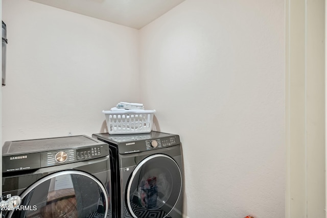 laundry room featuring washer and dryer