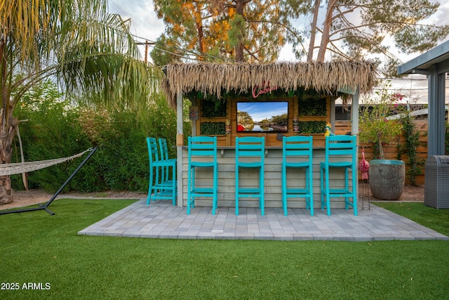 view of patio with a bar