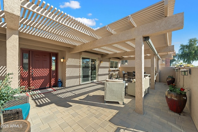 view of patio featuring a pergola