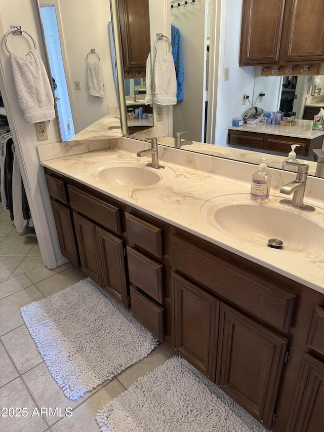 bathroom with vanity and tile patterned floors