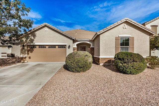 view of front of home with a garage