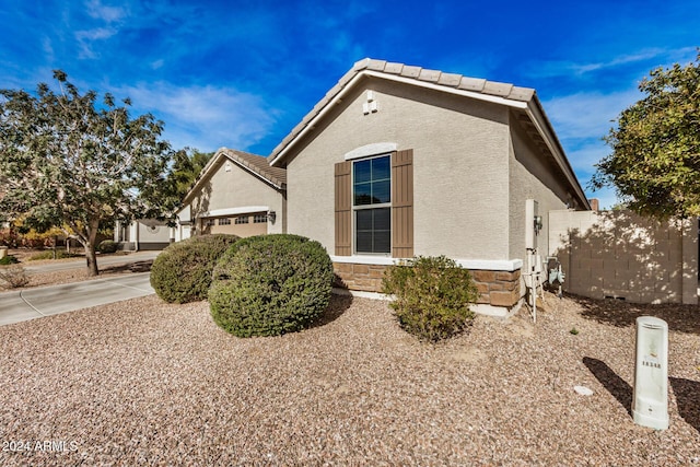 view of home's exterior featuring a garage