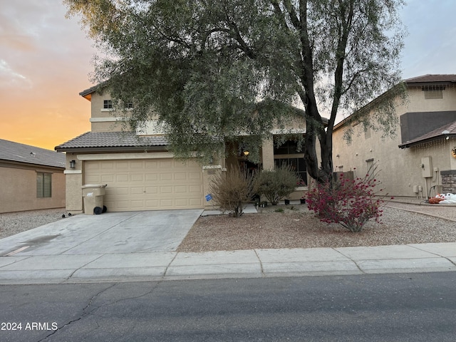 view of front of property featuring a garage