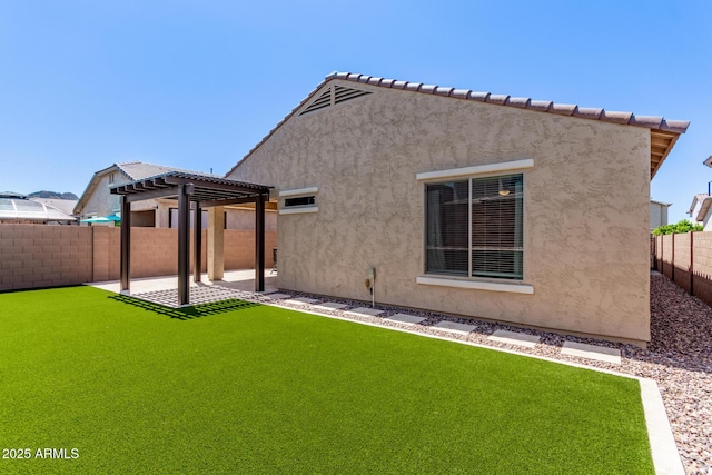 7086 W Spur Dr, Peoria, AZ 85383 - rear view of property featuring a pergola, a fenced backyard, stucco siding, and a patio