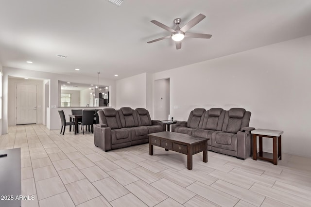 7086 W Spur Dr, Peoria, AZ 85383 - living room with a ceiling fan and recessed lighting