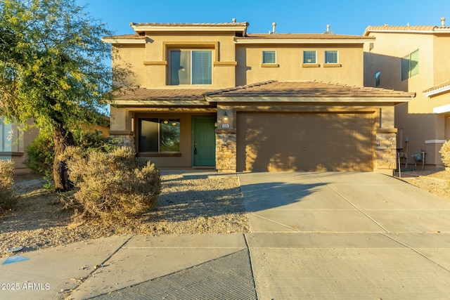 view of front of property with a garage