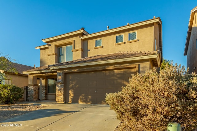 view of front of property featuring a garage