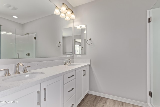 7492 E Via De Luna Dr, Scottsdale, AZ 85255 - full bath with a stall shower, double vanity, and wood finished floors