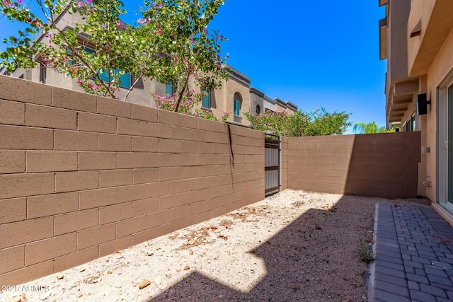 7492 E Via De Luna Dr, Scottsdale, AZ 85255 - view of yard featuring a gate