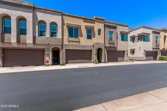 7492 E Via De Luna Dr, Scottsdale, AZ 85255 - multi unit property with an attached garage and stucco siding