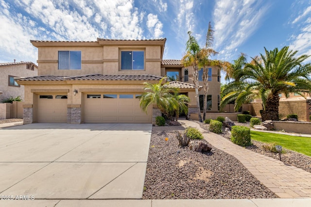 2302 S Canfield, Mesa, AZ 85209 - view of front of property featuring an attached garage, driveway, stucco siding, a tile roof, and stone siding