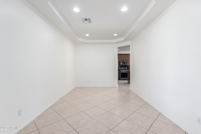 2302 S Canfield, Mesa, AZ 85209 - unfurnished room with recessed lighting, a raised ceiling, light tile patterned floors, and baseboards