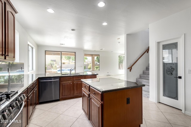 2302 S Canfield, Mesa, AZ 85209 - kitchen featuring dishwashing machine, a sink, stainless steel gas range, light tile patterned floors, and recessed lighting