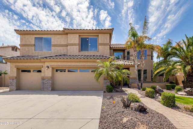 2302 S Canfield, Mesa, AZ 85209 - view of front of property with an attached garage, concrete driveway, stucco siding, and a tile roof