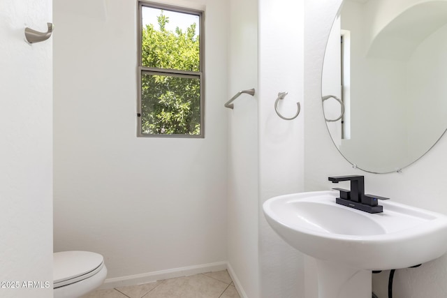 2302 S Canfield, Mesa, AZ 85209 - bathroom with tile patterned floors, toilet, a sink, and baseboards