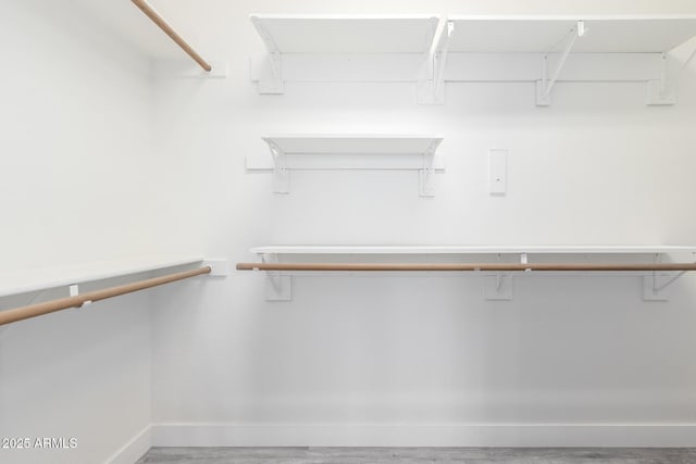 2302 S Canfield, Mesa, AZ 85209 - spacious closet featuring wood finished floors
