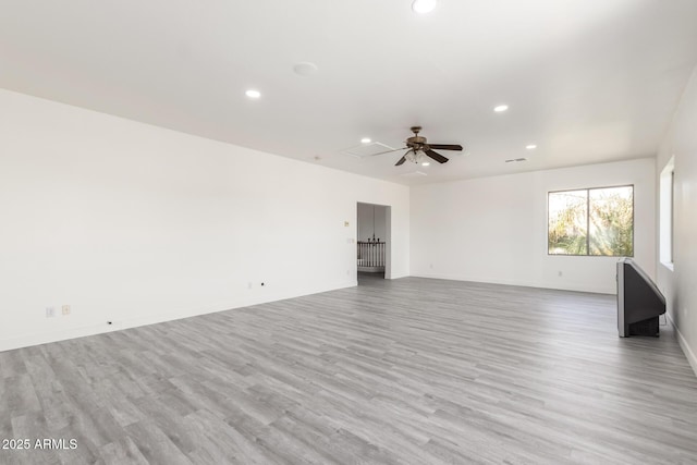 2302 S Canfield, Mesa, AZ 85209 - unfurnished living room featuring recessed lighting, wood finished floors, and baseboards