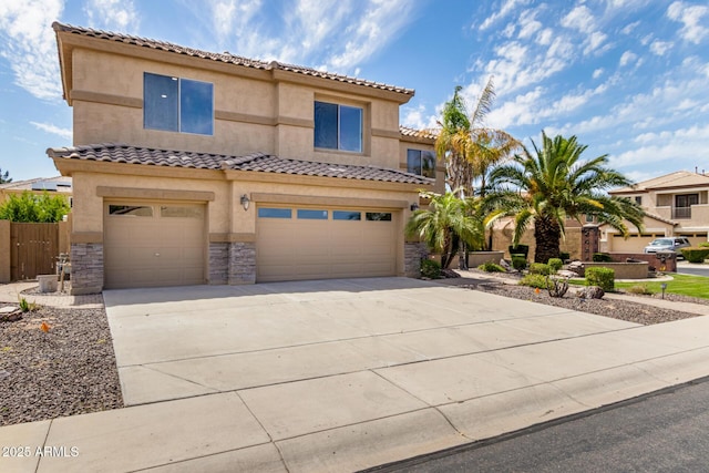 2302 S Canfield, Mesa, AZ 85209 - view of front of house featuring an attached garage, stucco siding, stone siding, driveway, and a tile roof