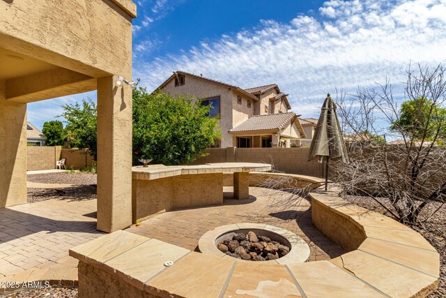 2302 S Canfield, Mesa, AZ 85209 - view of patio / terrace featuring a fire pit and a fenced backyard
