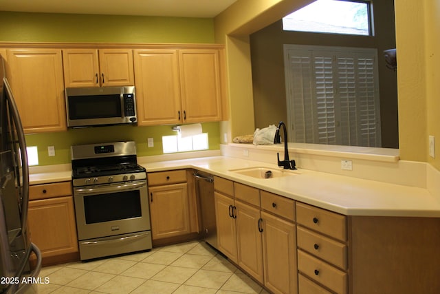 34464 N 68th Way, Scottsdale, AZ 85266 - kitchen featuring appliances with stainless steel finishes, light tile patterned floors, and light countertops