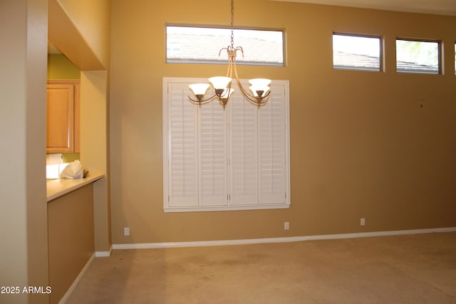 34464 N 68th Way, Scottsdale, AZ 85266 - unfurnished dining area featuring a chandelier and light colored carpet