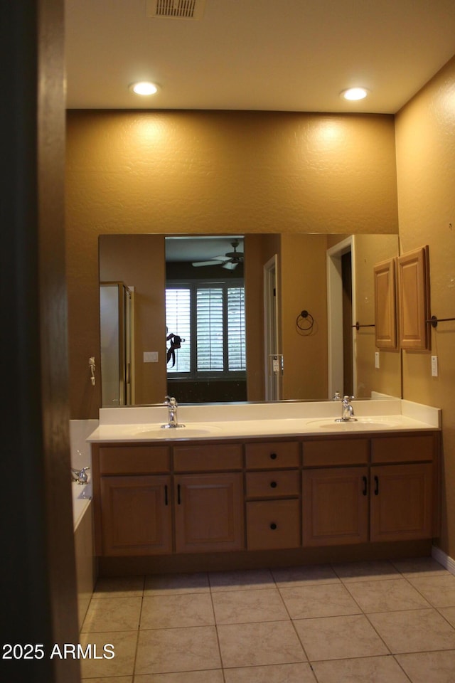 34464 N 68th Way, Scottsdale, AZ 85266 - bathroom with double vanity, tile patterned flooring, a bath, and ceiling fan