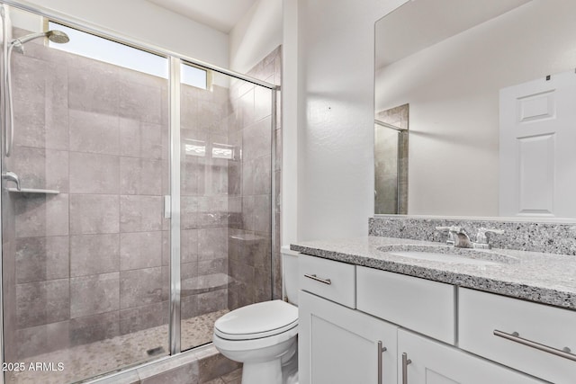 932 W Capulin Trl, San Tan Valley, AZ 85140 - bathroom with toilet, vanity, and a shower stall