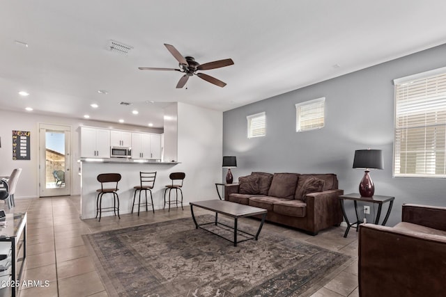 932 W Capulin Trl, San Tan Valley, AZ 85140 - living room with a ceiling fan, light tile patterned floors, and recessed lighting