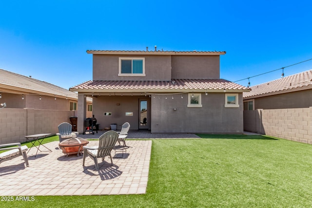 932 W Capulin Trl, San Tan Valley, AZ 85140 - rear view of property featuring a fire pit, a patio, stucco siding, and a tile roof