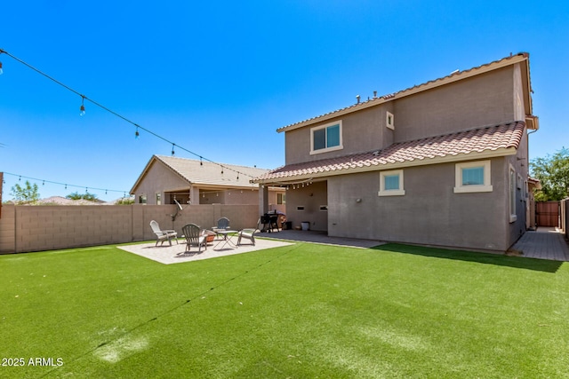 932 W Capulin Trl, San Tan Valley, AZ 85140 - rear view of house with stucco siding, a patio, a tiled roof, and a fire pit