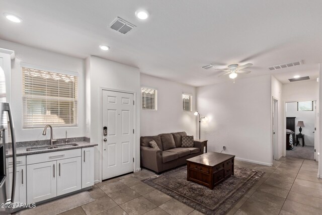 932 W Capulin Trl, San Tan Valley, AZ 85140 - living area featuring a ceiling fan, plenty of natural light, and recessed lighting
