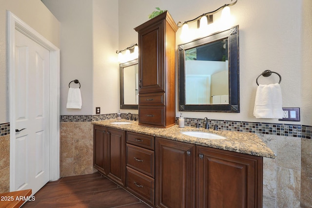 26647 N 43rd St N, Cave Creek, AZ 85331 - full bathroom featuring tile walls, double vanity, wainscoting, and wood finished floors