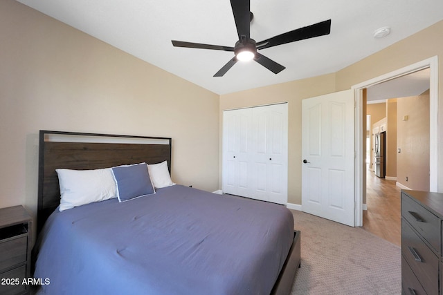26647 N 43rd St N, Cave Creek, AZ 85331 - bedroom with a closet, light colored carpet, ceiling fan, and stainless steel refrigerator