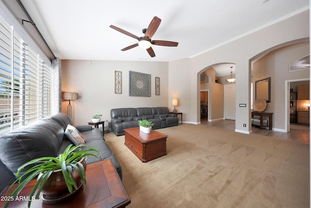 26647 N 43rd St N, Cave Creek, AZ 85331 - living room featuring a ceiling fan, arched walkways, and carpet