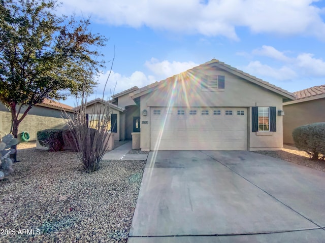 single story home featuring a garage