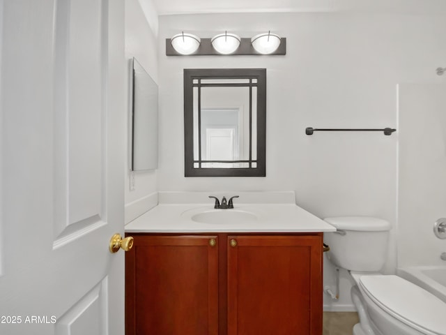 full bathroom featuring vanity, toilet, and  shower combination