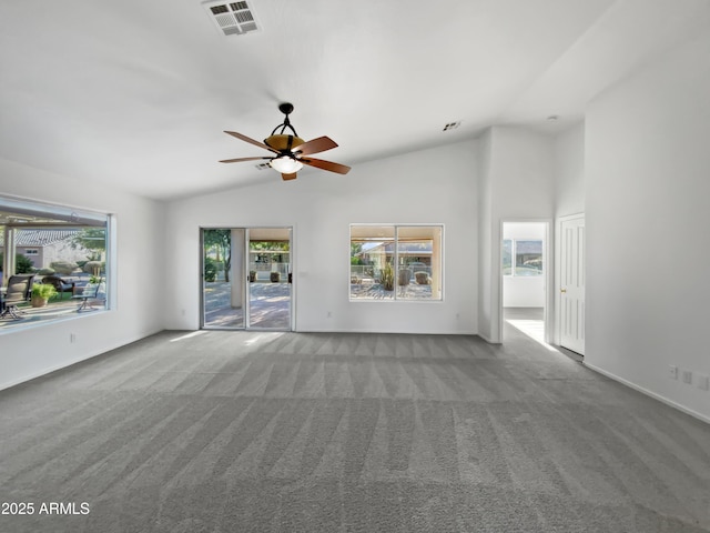 unfurnished living room featuring ceiling fan, light colored carpet, and lofted ceiling